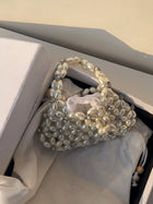 Mini Flower Pearl Clutch